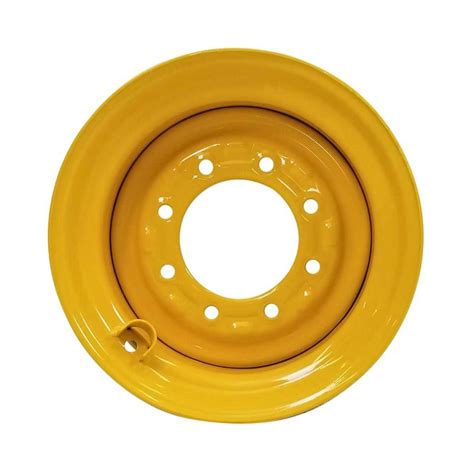hole skid loader wheel   backside vg nh yellow skid loader wheels