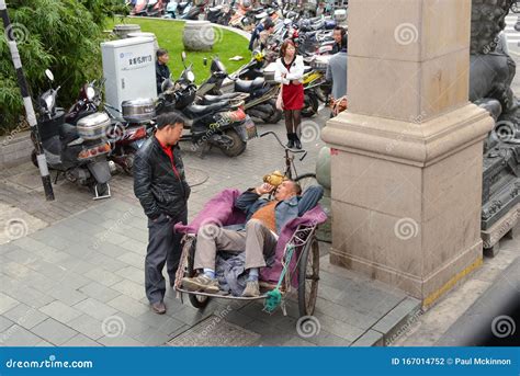Man Rests In Cycle Rickshaw In Shanghai China Editorial Photography