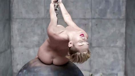 miley cyrus topless behind the scenes of wrecking ball scandal planet