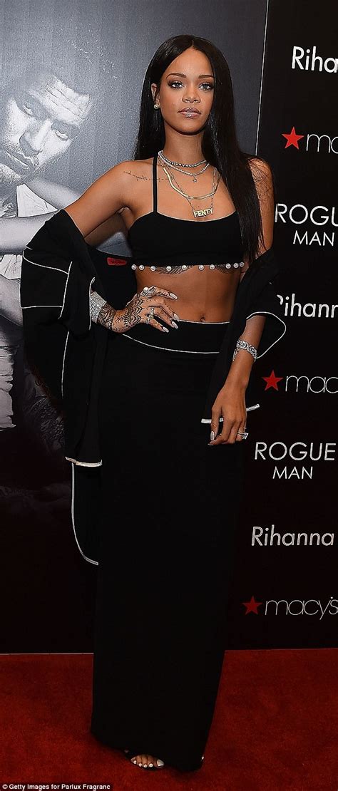 rihanna flashes some flesh as she launches cologne line at