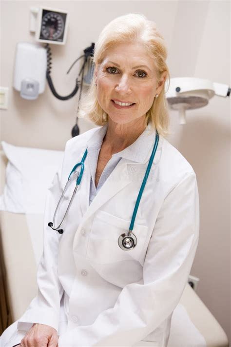 Middle Aged Female Doctor In Hospital Ward Stock Image Image Of Care