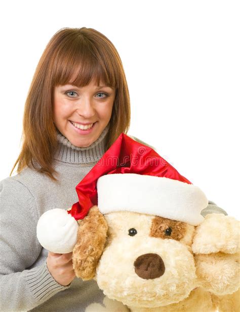 Claus ντύνει τη γυναίκα παιχνιδιών Santa σκυλιών Στοκ