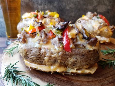 twice baked philly cheesesteak potatoes with homemade whiz give it some thyme