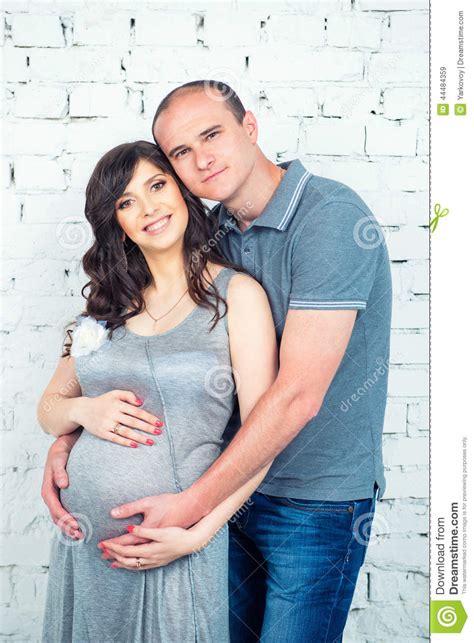 Happy Pregnant Couple Waiting For A Miracle Stock Image