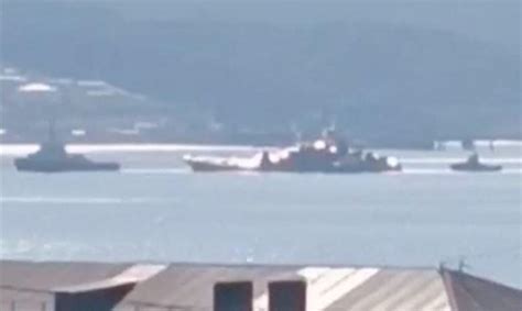 russian warship appears damaged  ukrainian drone attack  black sea port  novorossiysk