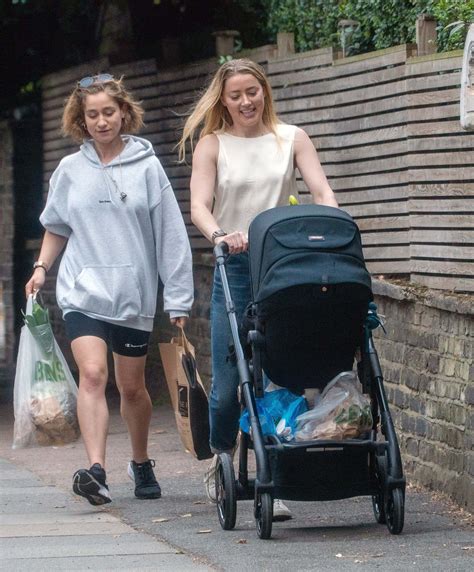 Amber Heard Takes Daughter For Walk Amid Johnny Depp Drama