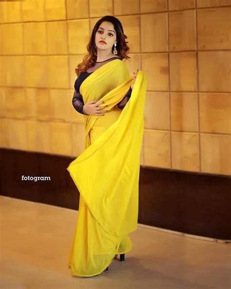 Acterss Malavika Menon In Yellow Saree Amazing Photos Goes Viral L