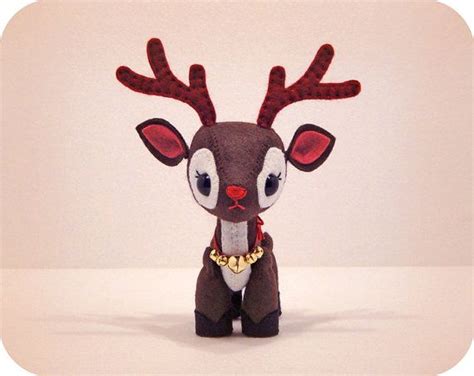 small stuffed animal  red antlers   head