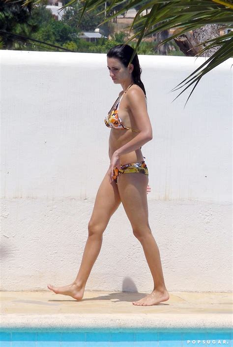 she relaxed by the pool in a floral bikini while on a july 2007 trip