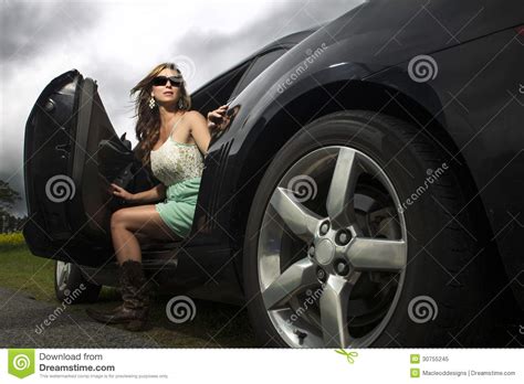 Woman In Boots Getting Out Of Car Stock Image Image Of