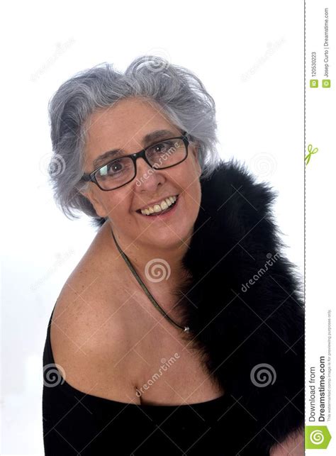 An Older Woman With A Posed On White Background Stock