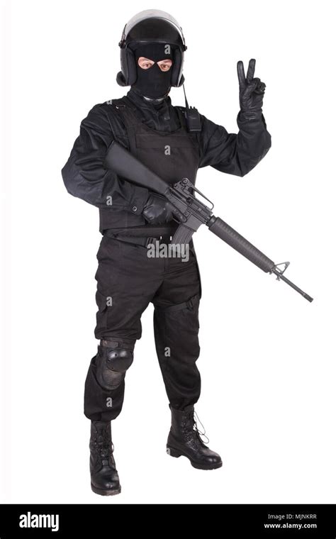 riot police officer  weapon  black uniform isolated  white