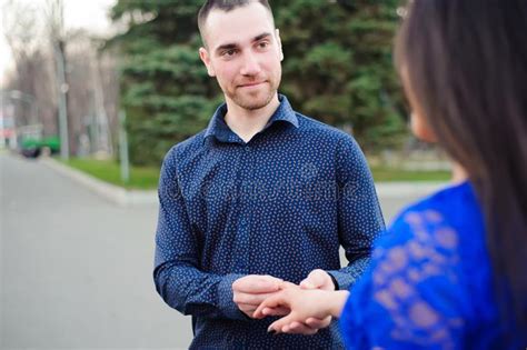 Man Asking His Girlfriend If She Wants To Marry Him Stock Image Image
