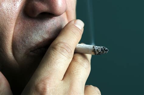 smoking appears linked  brain abnormalities  people  ms related
