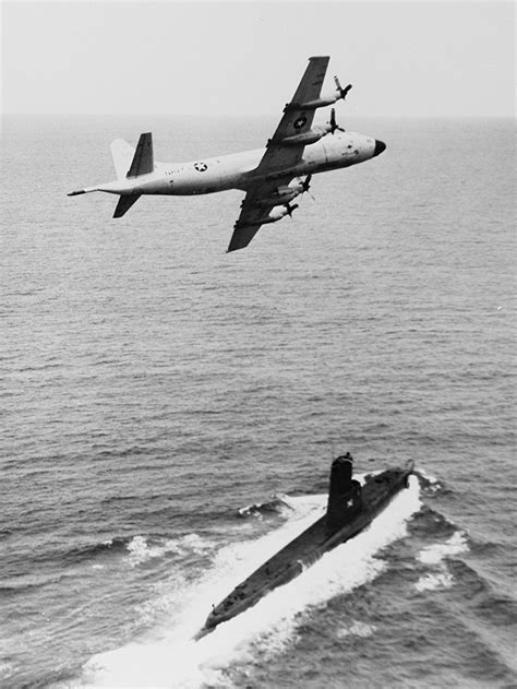retrowar “lockheed p 3 orion patrol plane over the submarine uss
