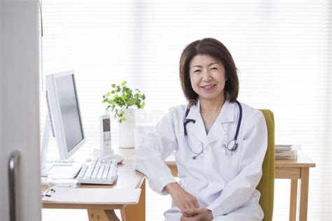 Reliable Japanese Female Doctor Stock Image Image Of Japanese Camera