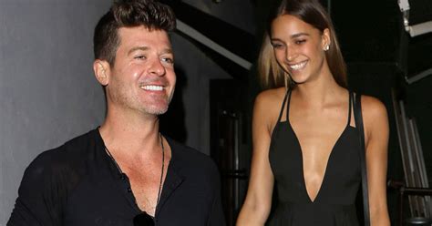 robin thicke and girlfriend april love geary both take the plunge in