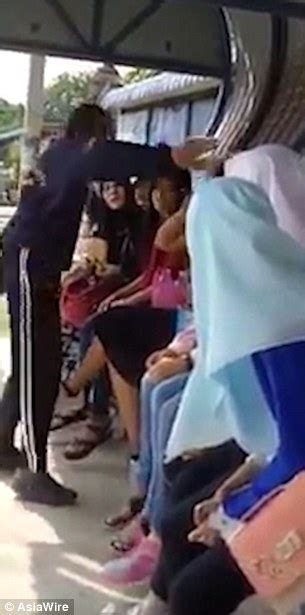 malaysian man slaps muslim woman for not wearing hijab daily mail online