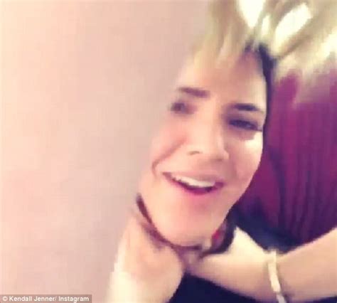 Khloe Kardashian Pretends To Choke Her Little Sister Kendall Jenner In