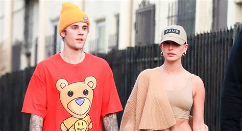 justin bieber and his clean shaven face spend quality time with wife