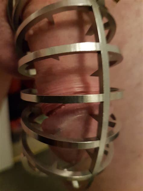 locked spiked chastity cage biting my little cock 4 pics