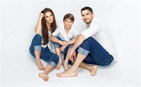 young family wearing jeans  white shirt stock photo image   kiuikson