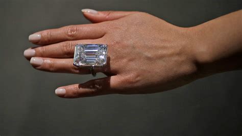 massive  carat diamond ring sells    auction