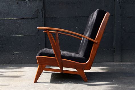 vintage design relax fauteuil teakhout zwarte kussens dehuiszwaluw