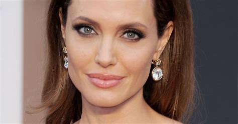 angelina jolie double mastectomy star faces one more operation as she recovers from losing both