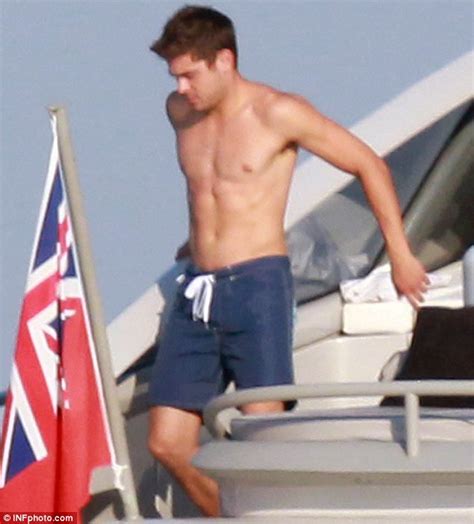 zac efron goes topless to soak up the st tropez sun after enjoying a boat ride with friends