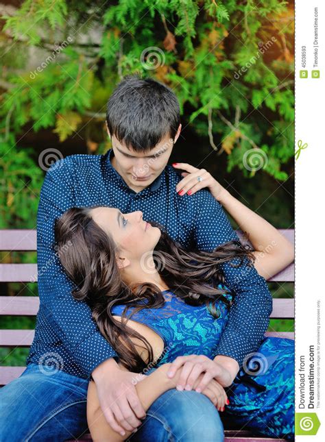 Beautiful Young Couple Having Picnic In Countryside Stock