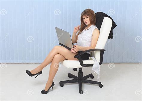 Young Sexual Girl Secretary Sits In An Armchair Stock Image Image