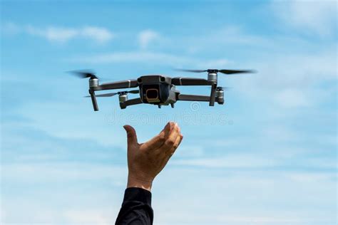 hands holding  drone stock photo image  filming