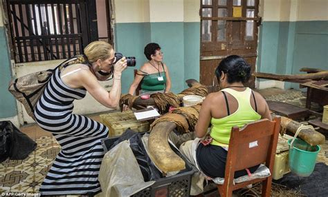 roll up roll up tourists flock to cuba to take part in havana s