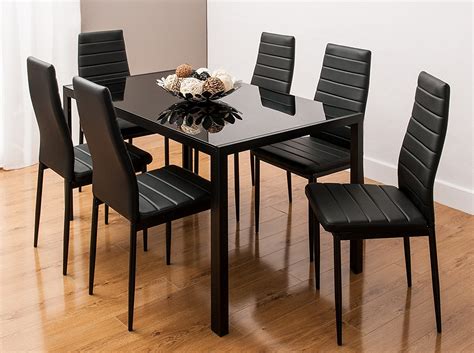 glass  black dining table set   black faux leather black chairs
