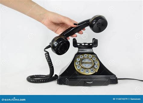 retro telephone hand picking   receiver stock image image  reaching ringing