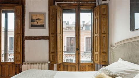 favorite airbnb  madrid  lofted apartment   balconies conde nast traveler
