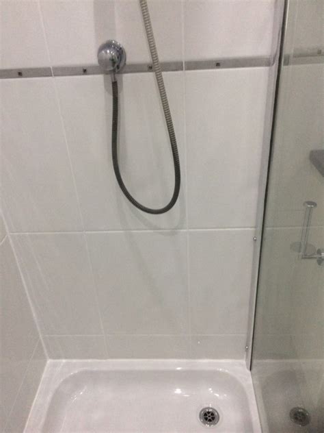 renovating  ceramic tiled shower cubicle  bury ceramic tile maintenance tips