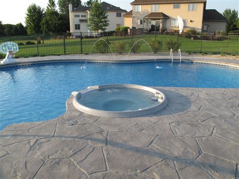 grey fox spillover spa installed by aqua pools in ground