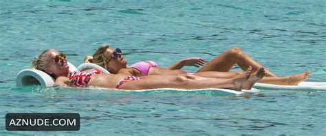 zara holland sexy in a pink bikini on the beach in barbados aznude