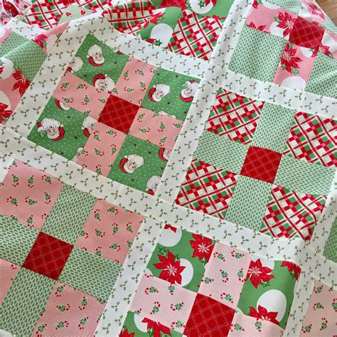 uneven  patch quilt pattern featuring swell christmas