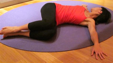 supine spinal twist supta matsyendrasana yoga pose