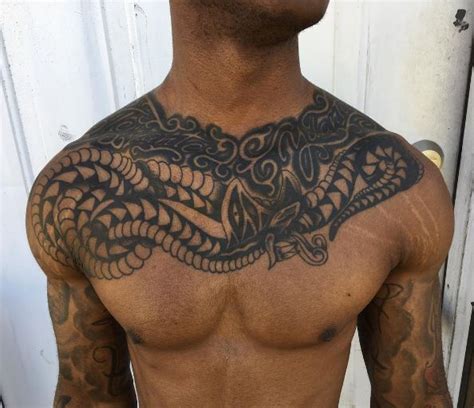 50 best chest tattoos for men 2022 tribal pieces and designs with meanings
