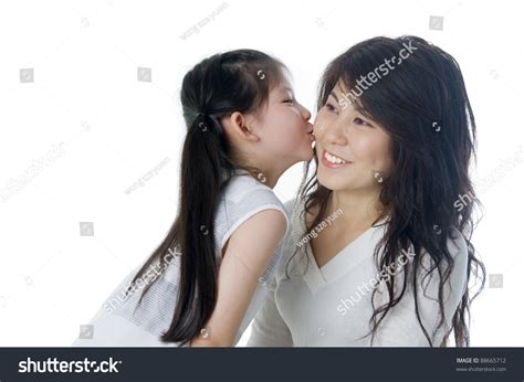 cute asian girl kissing her mother 스톡 사진 88665712 shutterstock
