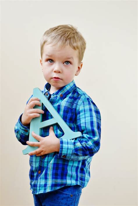 boy  wooden letter stock photo image  beautiful