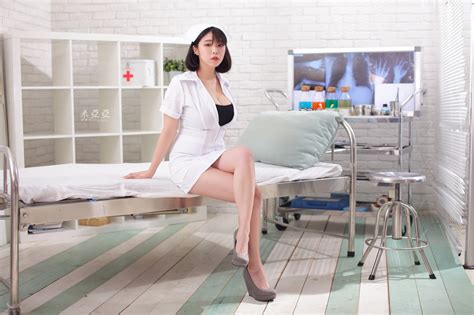 Wallpaper Brunette In Bed Sitting Cleavage Legs Nurses Nurse