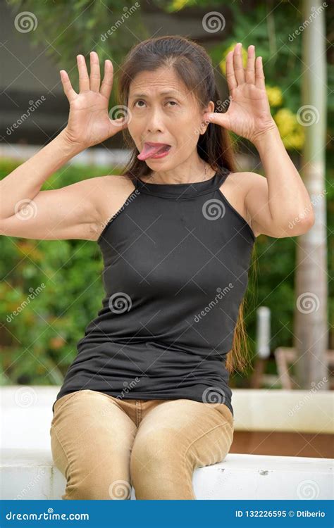Filipina Adult Female Making Funny Faces Stock Image Image Of Asian
