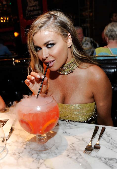 Carmen Electra Showing Huge Cleavage On Some Party Paparazzi Pictures