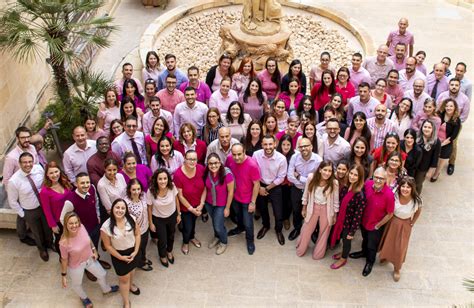 mapfre malta employees celebrate pink october   donations newsbook