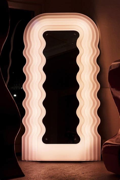pink ‘ultrafragola mirror designed by ettore sottsass for poltronova